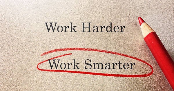 The words work harder crossed out and work smarter circled in red pencil