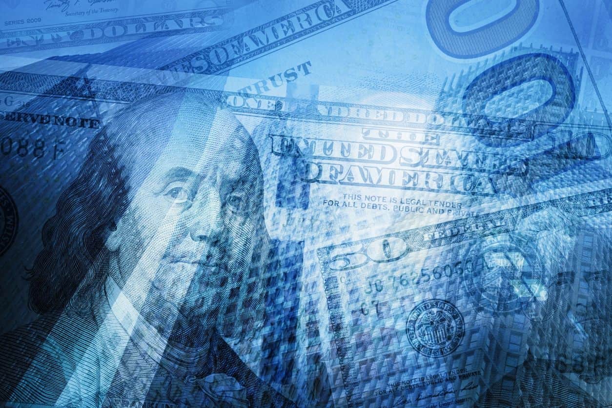 Close-up of U.S. hundred dollar bills representing year-end accounts receivable collections
