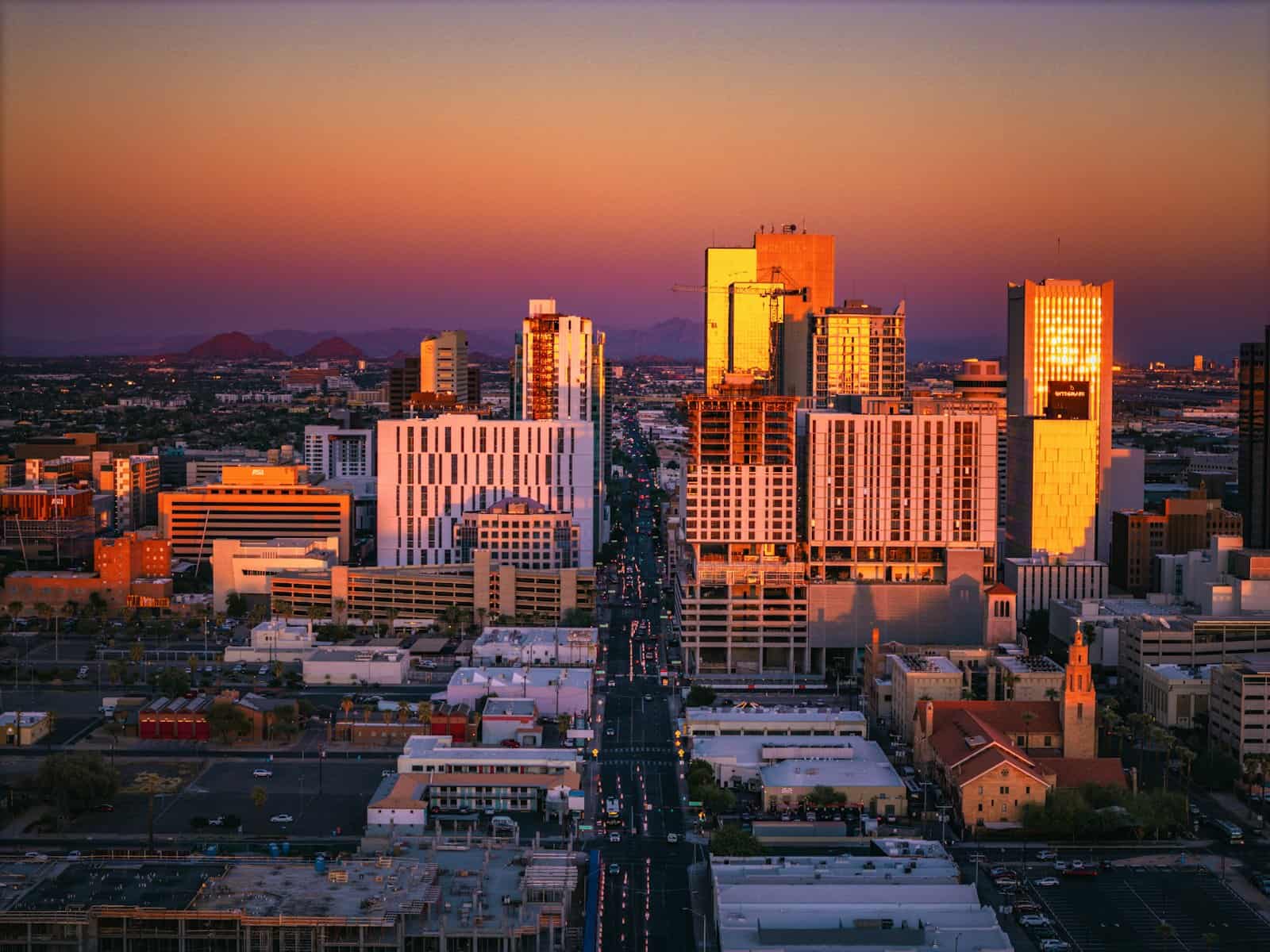 Downtown Phoenix, Arizona skyline at sunset, where The Guy That Gets You Paid collects commercial debt owed by Arizona businesses